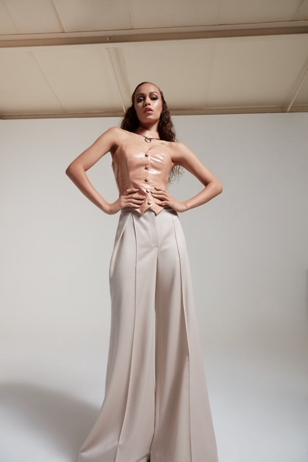 nude leather corset with wide leg wool pants