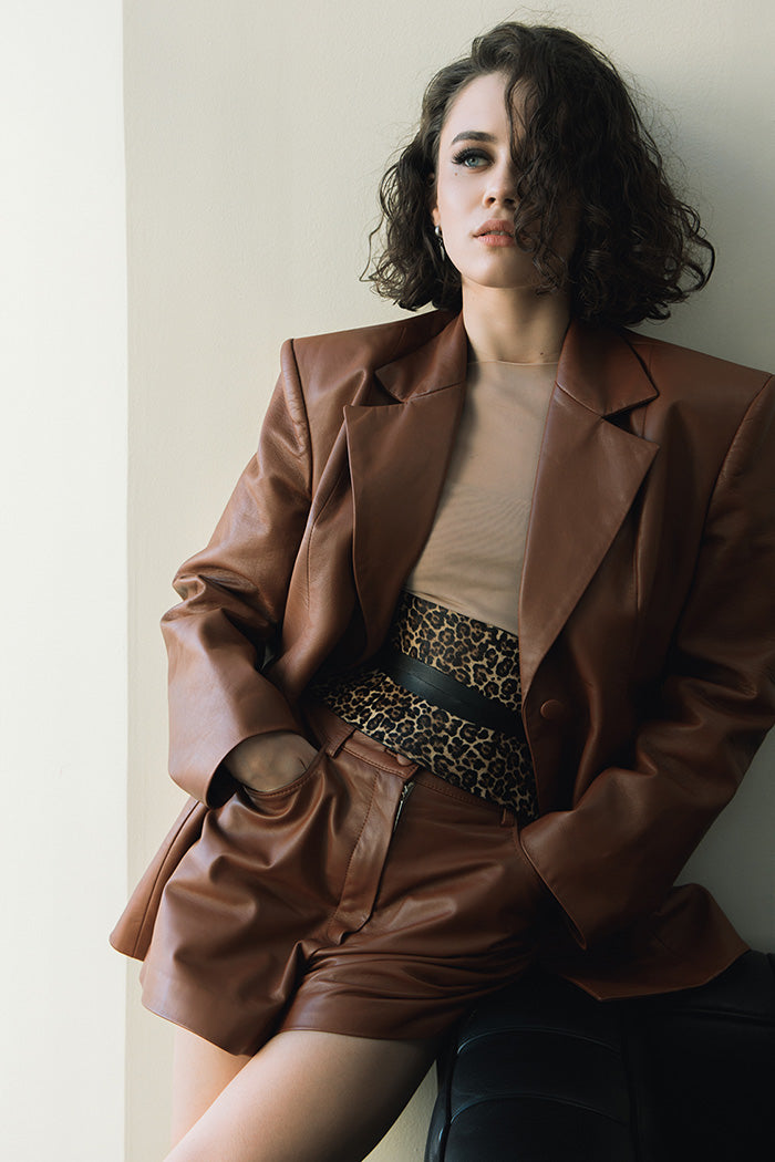 Model wearing PRITCH leather corset belt, leopard print