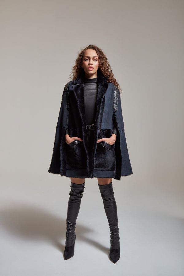 Shearling cape with python details and pockets in navy