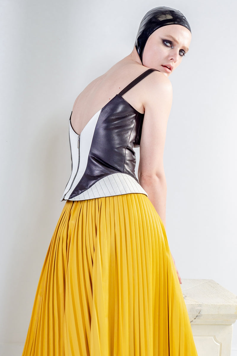 EOS pleated yellow skirt in leather