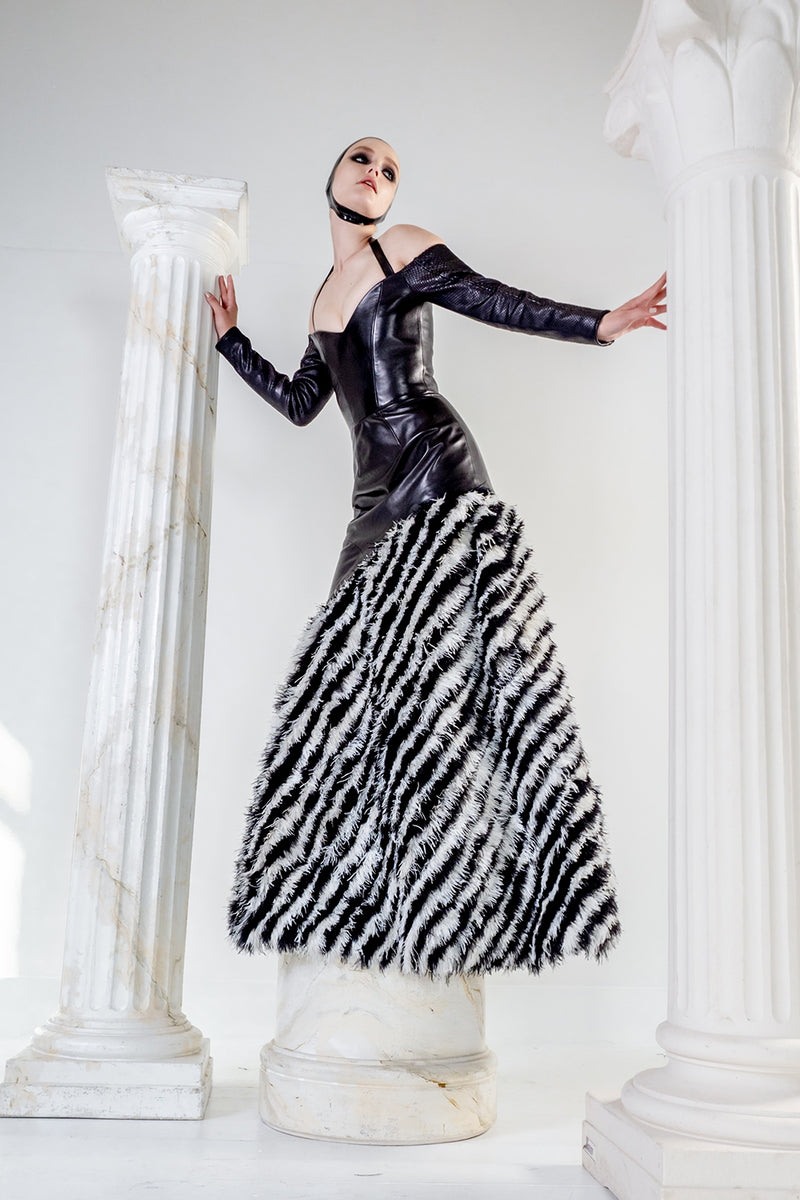Lyssa couture black leather dress with feathers and stretch python sleeves